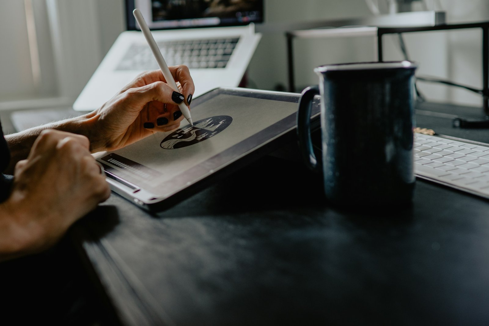 Designer working on logo identity details